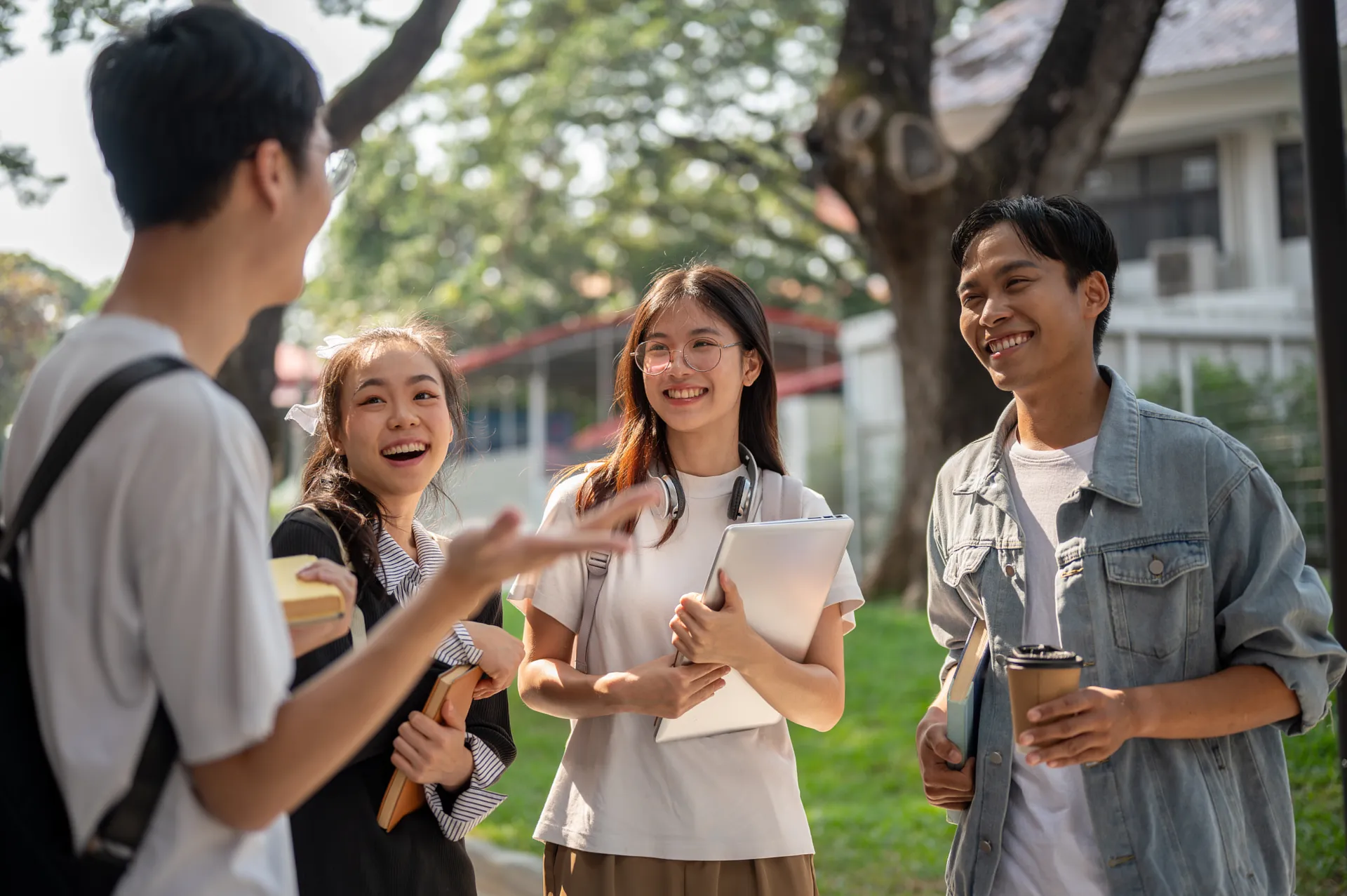 East Asian students walking across an Australian university campus
