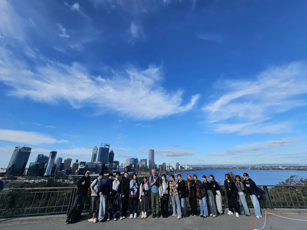 East Asian women friends exploring a city together