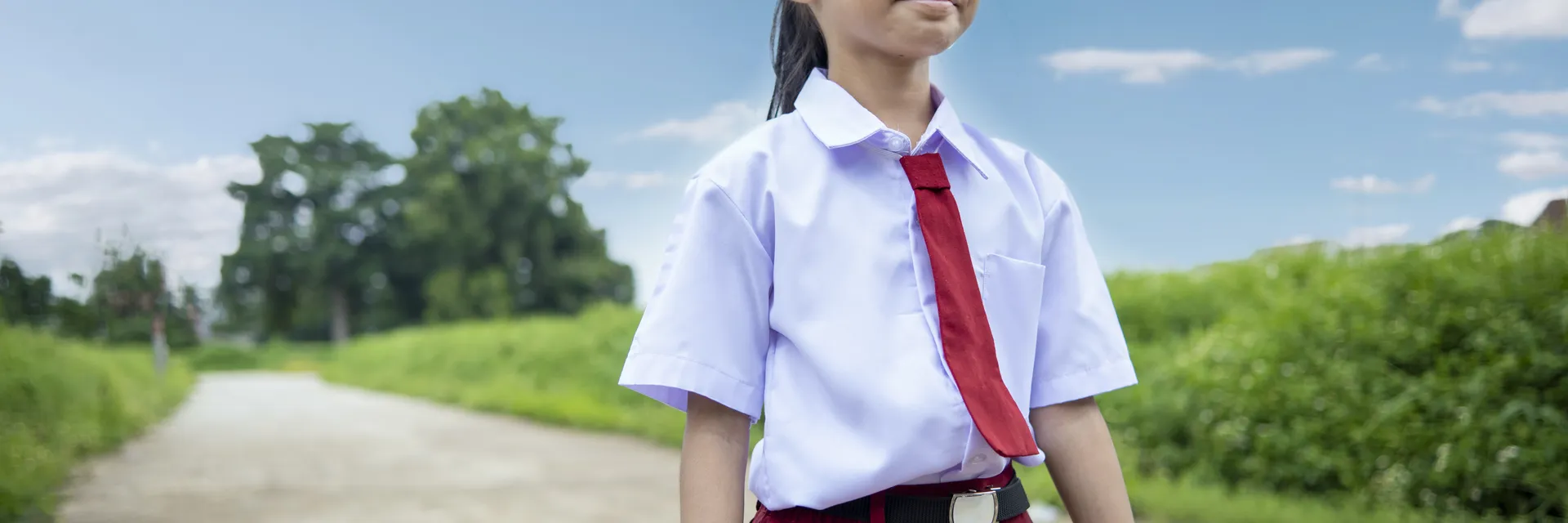 East Asian children in school uniforms in an Australian classroom